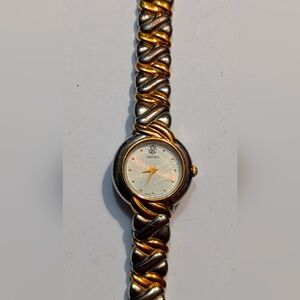 Seiko 1N00-1H40 Womens Diamond Accent Quartz Watch with two tone Case/BandDiamon